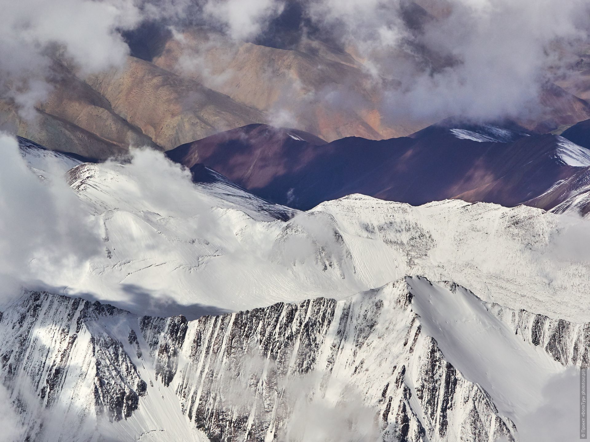 Flight Delhi-Leh, Ladakh mountains. Photo tour / tour Tibet of Lake-1: Pangong, Tso Moriri, Tso Kar, Tso Chiagar, Dance of Tsam on Lake Pangong, 08.07.-17.07.2022.