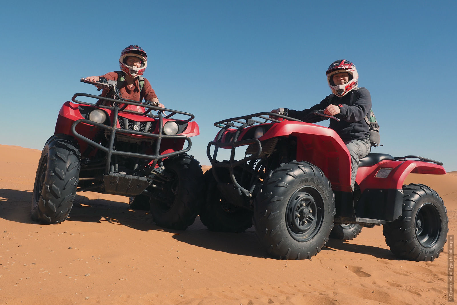 Riding a quadro on the dunes, Merzouga. Adventure photo tour: medina, cascades, sands and ports of Morocco, April 4 - 17, 2020.