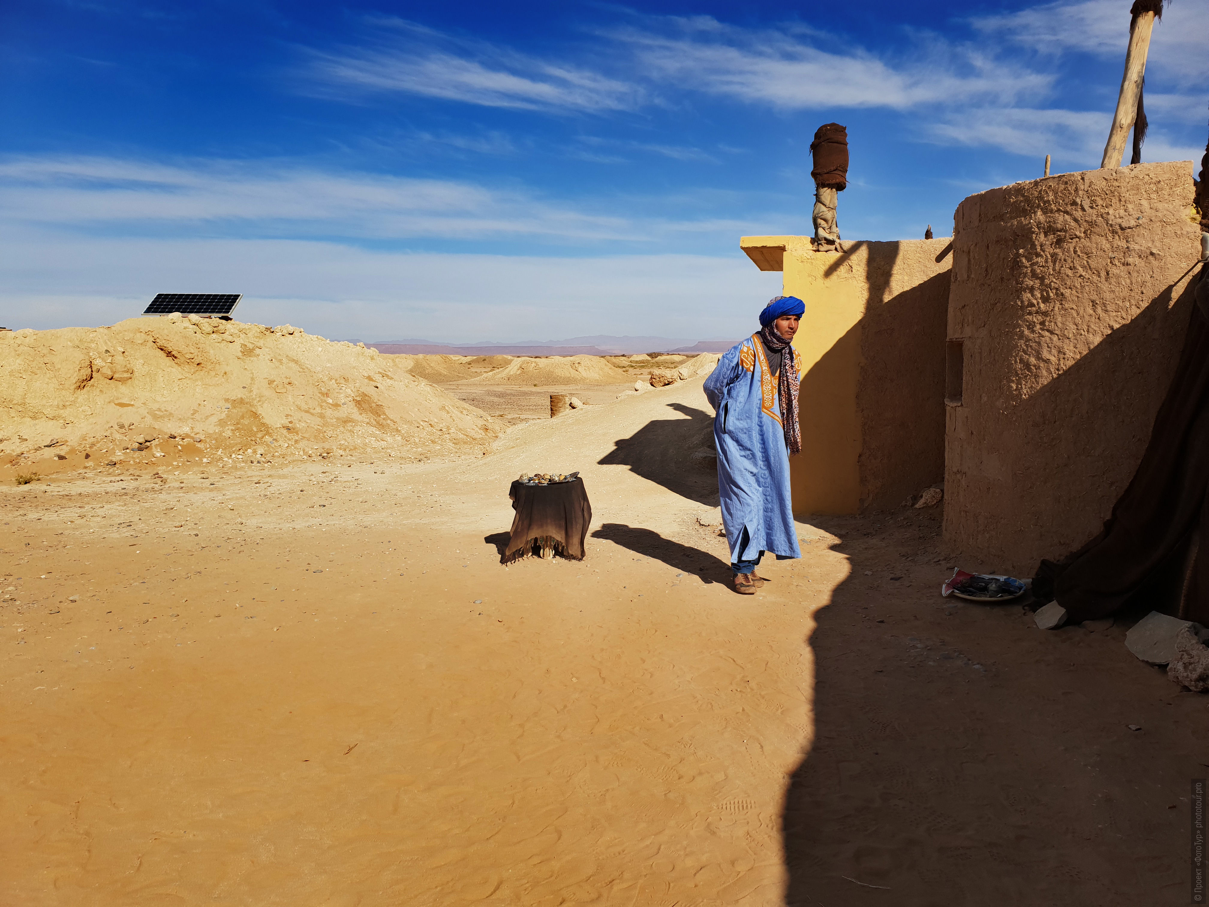 Berber in national dress, resident of Merzouga. Adventure photo tour: medina, cascades, sands and ports of Morocco, April 4 - 17, 2020.