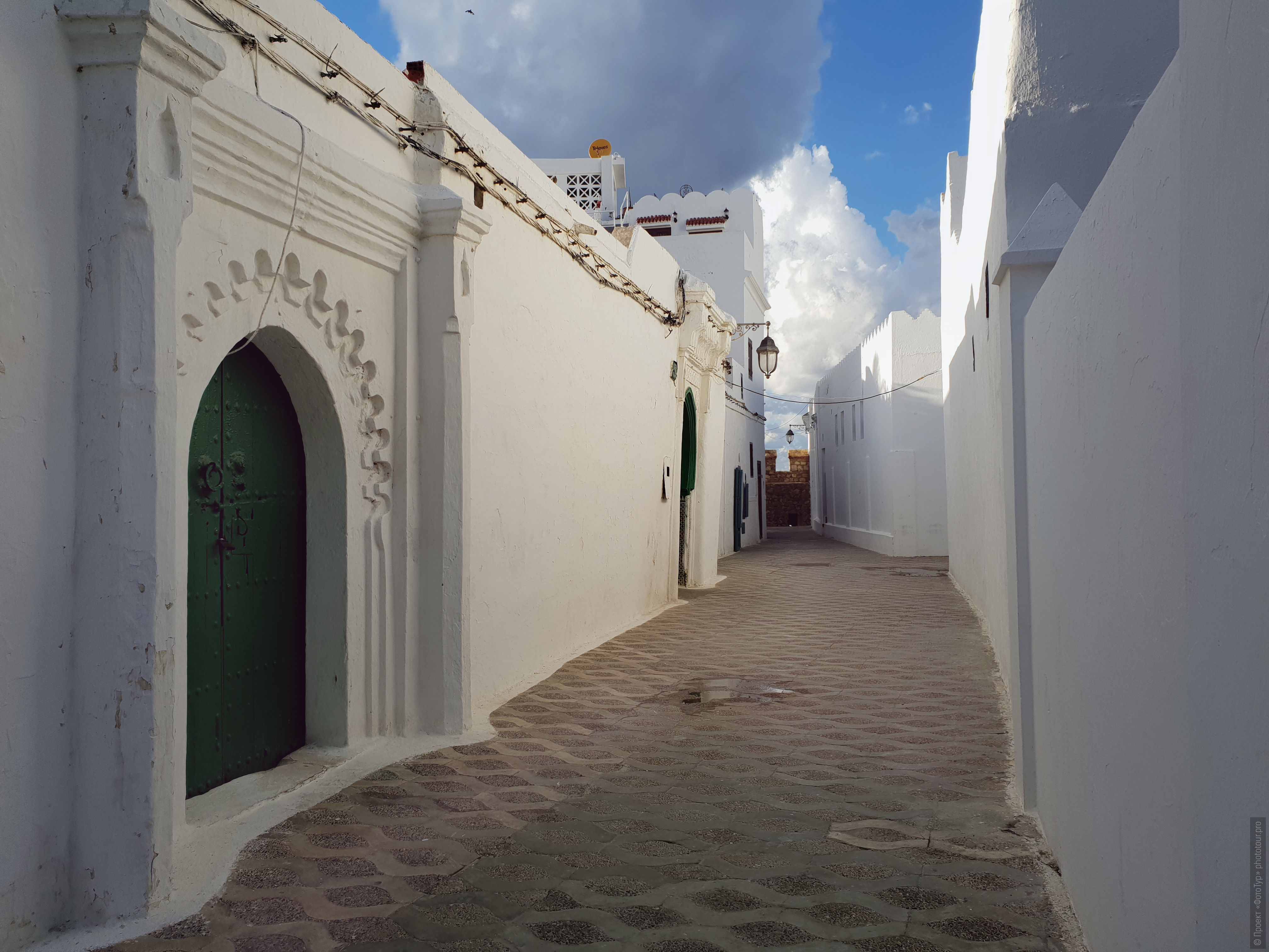The narrow streets of Asila. Adventure photo tour: medina, cascades, sands and ports of Morocco, April 4 - 17, 2020.