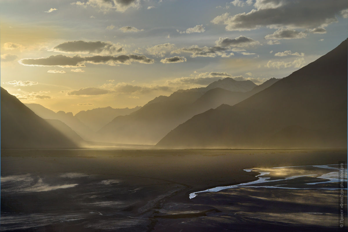 Sunset in the Nubra valley, view of the village of Hunder. Budget tour Ladakh and Nubra, July 21 - 30, 2018.